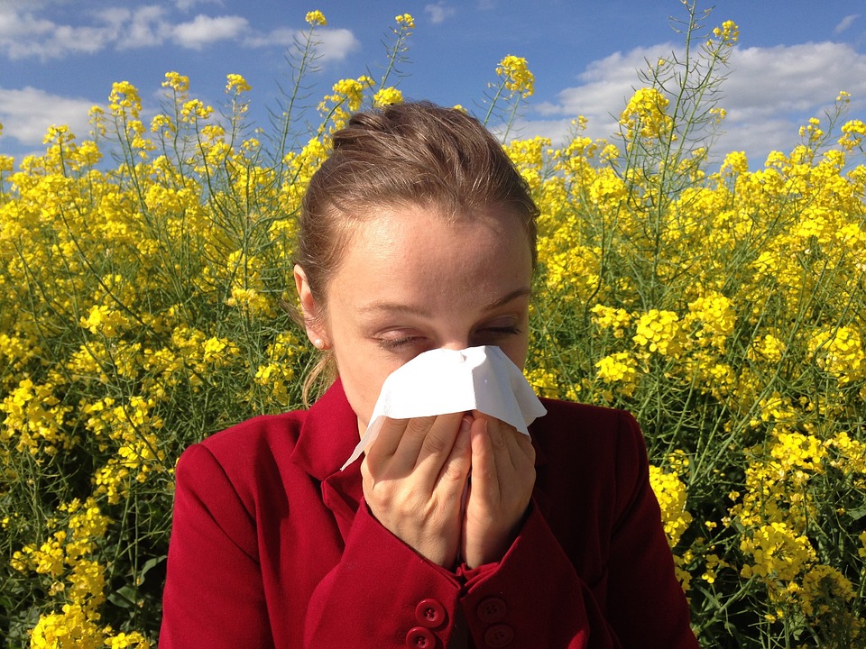 woman sneezing